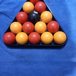 Pool table in very good condition 40" x 70" with cues ,balls and rest .