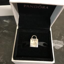Genuine Pandora bag charm like new comes in box.  Collection from WN7
First class signed for postage is available buyer to  cover the cost of £3.95