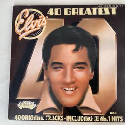 Elvis Presley
40 Greatest
Including 18 No 1 Hits
Double Vinyl LP Record
Released by Arcade Records 1975
Record Sleeve has some Double Print giving a Ghosting effect (misprint)
Vinyl Records in Good Condition