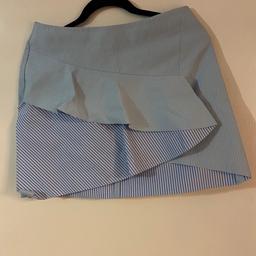 Hi and welcome to this great beautiful looking ladies Zara basics Ruffle Ra-Ra Stripe Mini Skirt Size Medium.

In like new Condition worn once thanks