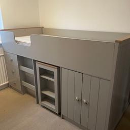 Lexington Mid Sleeper from The Range in light grey. Includes bed, pull out desk and a built-in shelf to the cupboard. Mattress not included. In excellent condition.
Height: 111.5cm
Width: 96cm
Length: 200cm
Suitable for Ages: 6+
Weight: 113.4kg
Bedside Table Height: 73cm
Bedside Table Width: 79.6cm
Bedside Table Depth: 39.6cm
Drawer height: 21.9cm
Drawer width: 38.2cm
Drawer depth: 36.2cm
Finish: Oak Effect
Weight Capacity: 170kg

Will be dismantled for collection.