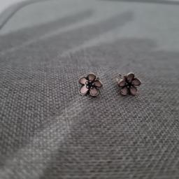 pandora cherry blossom stud earrings never worn in perfect condition.