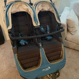 Baby Jogger City Mini Double.footmuffs raincover

City mini double in aqua colour (blue/green).
In very good condition some scratches on wheels
Includes raincover and 2 footmuffs (sell for £40 each on here)


* Fits through standard doorway

• light weight even with 2 children

fits in a boot with ease, we have 1 series BMW
* Quick fold technology - folds completely flat and wheels can be removed.
* Seats fully recline with 5 point harness.
Hood canopies