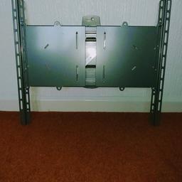 Large very strong wall bracket for a wall mounted TV complete with screws, variable distance on brackets to allow for different sized TV’s