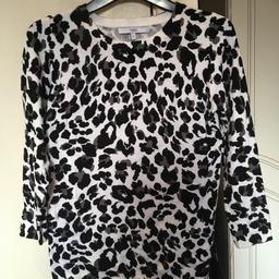 White jumper with black leopard print from Next. Size UK 8. 3/4 sleeve.
