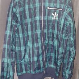 Rare vintage Adidas Originals Rebel Soles colab light tartan check jacket.
Size L can fit a medium.
Ykk zips and in super condition.
Check out my other items for sale.
