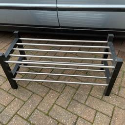Shoe rack for sale 

Approx measurements are;

31 inches length 
12.5 inches deep 
14.5 inches high 

Collection only