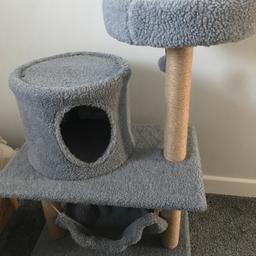 Brand new cat tower and bed. H - 92cm W- 62cm D - 41cm. Cat prefers the spare bed!