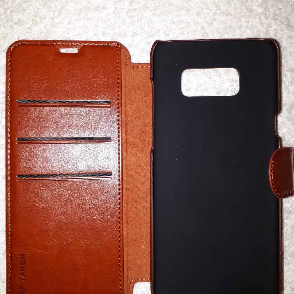 As new tan leather wallet case for Samsung Galaxy S8 Plus by Taken. Has slots for cards and comes with a soft drawstring bag. As well as free collection from us, we also offer UK postal delivery for £3.19.