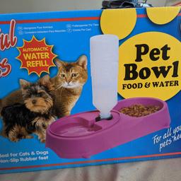 brand new. dual bowl for cats and dogs.
food and water with water dispenser unit to keep your pets with a good water supply all day.
brand new in box. 
red and blue available. let me know when buying which colour.
collection or delivery.