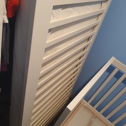 a white ikea cot bed 2 draws with mattress also 2 toddler pillows 2 cover and duvet and 2 mattress protectors.