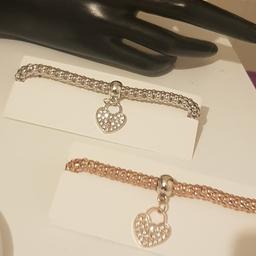 modern streachy heart bracelet 
£2 each 
can post 2nd class signed for and can bundle items into one parcel