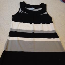 size 8 striped oasis vest top, lovely condition only worn once, cost £30 new grab a bargain, collection only please