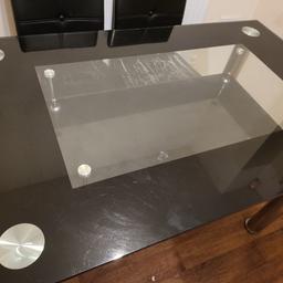 glass dining table in good condition..normal wear and tear