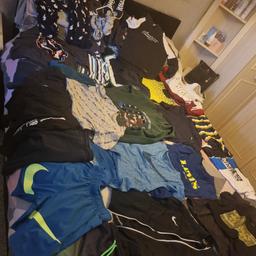 all items in brill condition nike jacket top. nike shorts and tshirt set. levis top. under amour shorts. 3 shorts. 3 hoodies jumpers. 3 pjs. riverisland next tshirts. trainers and shoe boots from next. underpants not worn. over 30 items. can post but only accept payment by bank transfer. receipt and parcel pics send