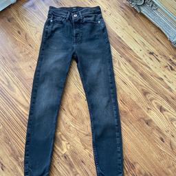 Like new pre owned black jeans with fly front and ankle detail. Size 6R