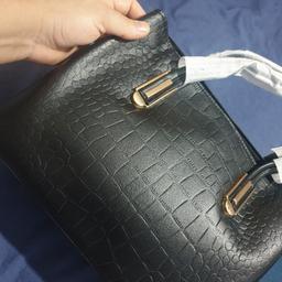 brand new black handbag for sale three pockets inside and shoulder strap included
any questions welcome sorry no delivery or returns available.
Thanks for looking