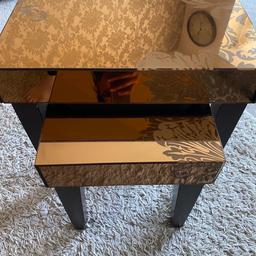 In excellent condition, beautiful unique glass coffee tables with beautiful damask design on both table. Wooden legs. These were bought expensive , only selling as change of decor.