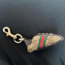Gucci key ring

Bought years and years ago from selfridges cost over £100 at the time,
Signs of wear on the gold metal part of key ring but the shoe itself is in really good condition.

Great item for a collection or to attach to beg etc
1000% genuine 
Open to offers