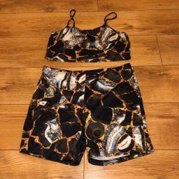 Gorgeous BN plus size marble cami top and cycling shorts set
Size 18

Pick up TS4 Longlands area or can post but buyer must pay postage