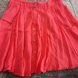 Pretty coral coloured button through skirt from Topshop size 6