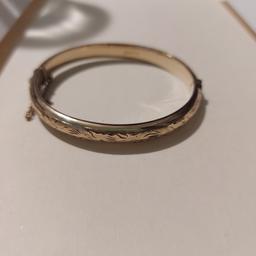 Engraved hinged Rolled Gold Bangle 
Nice vintage condition 
posted 1st Class signed for
or Collection ST13
