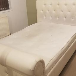 A double bed with mattress 
good condition
studded diamond headboard
chunky but still looks great.
Leather
white cream colour
 shows slight discolouration but its generally hidden behind the pillows as its further down the headboard.
Open to offers.