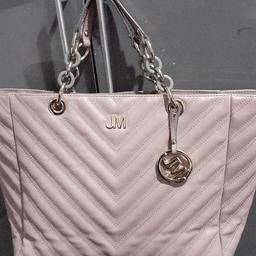 hardly used nude pink julien macdonald bag...two handles..interior compartments...
collection only...collect hx1