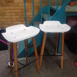 2 wooden and white bar stools can be used inside or outside. good condition just need a good wash