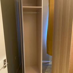 Single wardrobe suitable for long hanging although fittings can be altered and additional shelves purchased. White surround and high gloss grey door.

Needs to be collected S18 area Saturday/Sunday
