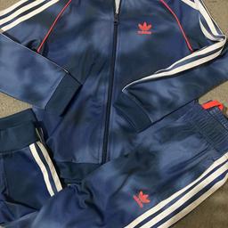Boys 7-8years original Adidas tracksuit 
Worn once do in great condition
Pet smoke free house