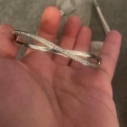 Lovely Pandora Entwined Bangle. Excellent condition as hardly worn. Size 2