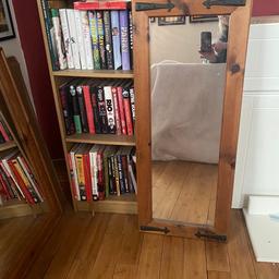 Slim mirror with wood surround and a couple of details on the frame size 17 inches wide x 41 inches long, from a nonsmoking house buyer collects please