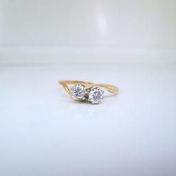 A beautiful natural vintage Toi Et Moi (you and me) double Diamond dainty ring

Professionally cleaned & polished & presented with a brand new ring box

Ring size L
If you would like this ring re-sizing please get in touch

18ct yellow gold & platinum
1.9 grams
2 round brilliant cut Diamonds
.34ct total Diamond carat weight
Si2-H clarity & colour
Stamped 18ct

Free next day delivery
Worldwide shipping
Returns always accepted
Any questions, please don't hesitate to ask