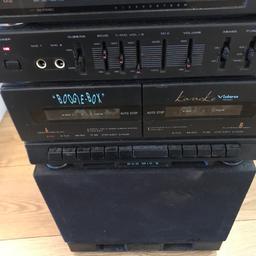 Radio dial missing

Both tape deck working 

Been stored away 

No microphones included