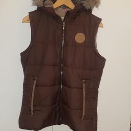 perfect condition  size 12UK women's body warmer 
please look at my other items