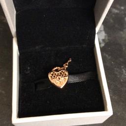 Genuine Pandora rose heart and key charm, says love you on it, like new as unwanted gift