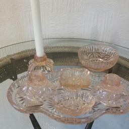Lovely 7 piece ponk glass dressing table set
Will post
