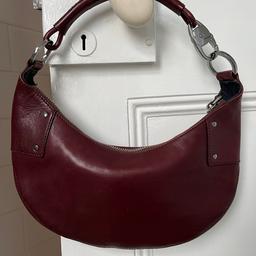 Genuine Authentic Gucci brown leather half moon shoulder bag. Used bag but in great condition.
