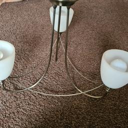 a 3 arm ceiling light and pair of wall lights , full working order removed due to decorating.