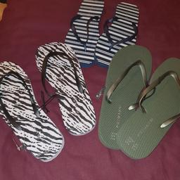 3 pairs of brand new  flip flops size 7/8