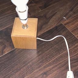 Wooden Table Light

Electric works properly switch is fault and does not come with lamp shade and bulb is not included.