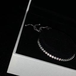 A beautiful gift for anyone special. It is an unwanted gift so in perfect condition, never worn. Comes with original box.