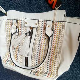 its brand new with tags
white Colour 
dimensions are 42cmx27cmx13cm