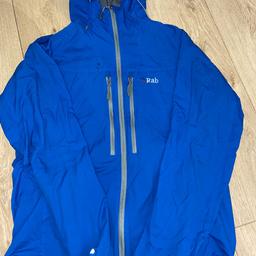 Blue rab jacket, size large. Lovely jacket that goes with everything. Slight mark, but everything else is fine. From a smoke free clean home.
