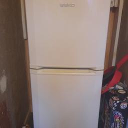 beko white fridge freezer. fridge at bottom freezer at top. perfect working condition just a few minor cosmetic marks. reason for sale is we need a much bigger one to meet the needs of our family.
