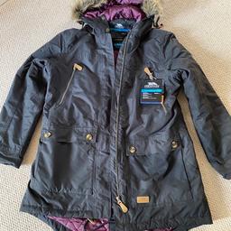Trespass Clea parka, waterproof coat in size XL/16. Brand new with tags. Black in colour with lovely purple lining, has removable faux fur around hood