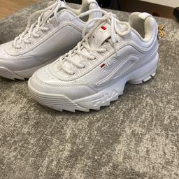 Very comfortable, white fila trainers. These go with everything!