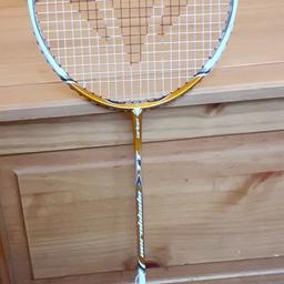 New badminton racket in gold, I have 2 rackets, one with a white handle and 1 with a white handle, white handle covering slightly damaged just needs to be rewrapped .