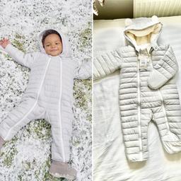 The White Company quilted unisex pramsuit ,a super-soft faux-shearling lining in the hood/ mittens,faux-shearling lining • Double zipper, • Fold-over feet &mitts • Bear ears &embroidered paw details • All embroidery is backed with soft nylon to ensure no irritation to skin

Size 9-12 months. Tried on in the house for an hour or so to get baby use to it however he did not like it. Never ended up using this! Bought on 18/10/21 as shown by receipt! No offers.Still on website! Light & WARM!baby coat
